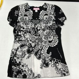 Koi Brand top.  Size Small.  Worn as scrubs.  One owner.  Excellent condition.